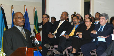 Governor General, His Excellency the Most Honourable Professor Kenneth Hall (left), addresses the audience at a public lecture hosted at the Hilton Kingston Hotel