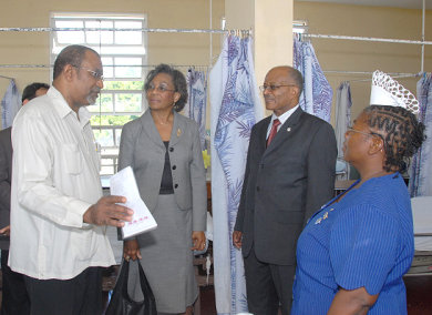 Governor General, His Excellency Professor Sir Kenneth Hall (2nd right), listens to Senior Medical Officer at the Princess Margaret Hospital Cecil Batchelor (left) during a tour of the facility in St. Thomas. Looking on are Lady Rheima Hall (2nd left) and Acting Matron at the hospital, Marjorie Howell.