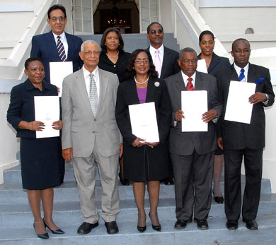 Deputy Governor-General, the Very Reverend Canon Weeville Gordon (second left), in the company of (from left): Her Honour, Sarah Thompson James, to act as Puisne Judge; Justice Gloria Smith, to act as Judge of the Court of Appeal; His Honour Martin Gayle, to act as Puisne Judge and His Honour, Bertram Morrison, to act as Puisne Judge. In back row (from left) are: Justice Mahadev Dukharan, to act as Judge of the Court of Appeal; Chief Justice, Zaila McCalla; President of the Court of Appeal, Justice Seymour Panton and Her Honour, Marva McDonald Bishop, to act as Judge of the Court of Appeal. Occasion was a swearing-in ceremony, held at King's House on September 15.