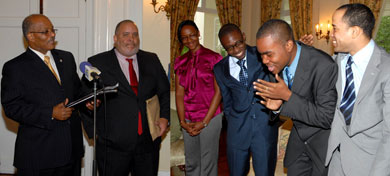 The 2009 Jamaica Rhodes Scholar, Michael Waul (2nd right), is elated at the news of his selection, during the announcement by Governor-General, His Excellency, the Most Hon. Professor Sir Kenneth Hall (left), at King's House on November 14. Others from left are: Secretary of the Jamaica Rhodes Selection Committee, Peter Goldson, and scholarship candidates, Simone Stewart, Derron Wallace and Jeffrey Brown.