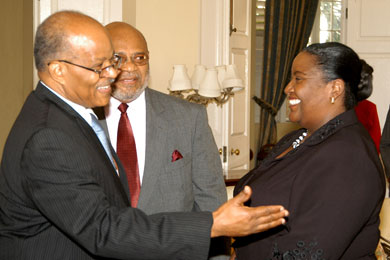 Governor-General, His Excellency the Most Hon. Professor Sir Kenneth Hall (left), welcoming Chief Executive Officer (CEO) of the Dispute Resolution Foundation, Donna Parchment (right), at King's House today (January 6), while Chairman of the Foundation, Novar McDonald (centre), looks on. Occasion was the reading of a proclamation by the Governor-General, declaring 2009 as the 'National Year of Dispute Resolution'.