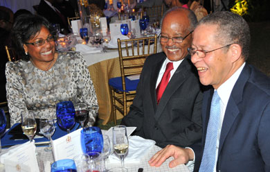 Prime Minister, Bruce Golding (right), is in light conversation with Governor-General, His Excellency the Most Hon. Professor Sir Kenneth Hall and Lady Hall, at a farewell dinner, which the Prime Minister hosted for Sir Kenneth last night (Feb. 20) at Jamaica House.