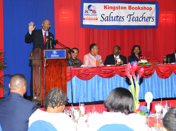 Governor General, his Excellency, the Most Hon. Dr. Patrick Allen (at podium) delivering his keynote presentation at the Kingston Bookshop Teachers' Luncheon at the Hilton Kingston Hotel on Tuesday(March 5). At the head table from left are: Chairperson for the function, Fae Ellington; Principal of Lyssons Primary School, Ena Barclay; President of the Jamaica Independent Schools' Association, Basil Tabanor; and Director of Administration at the Kingston Bookshop, Sonia Fuller.