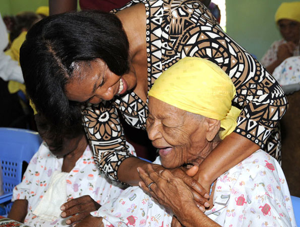 Wife of the Governor-General, the Most Hon. Mrs. Allen, embraces a resident at the Missionaries of Charity Home for the Aged, Sophia, during a tour of the facility in downtown Kingston on Tuesday (June 2).