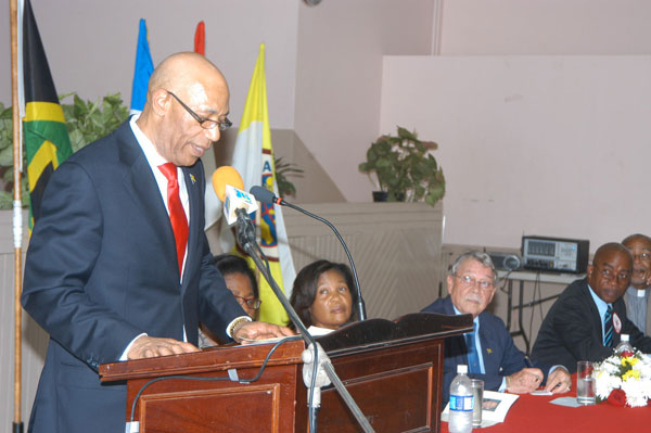 Governor-General, His Excellency the Most Hon. Sir Patrick Allen addressing a civic ceremony, held at St. Gabriel's Anglican Church in May Pen on July 16. Looking on (from second left) are: Her Excellency the Most Hon. Lady Allen; Custos of Clarendon, Hon. James deRoux; and His Worship the Mayor of May Pen, Councillor Milton Brown.