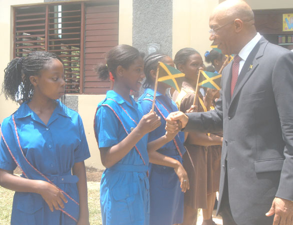 Governor-General, His Excellency the Most Hon. Sir Patrick Allen, meeting students of the Porus High, and Primary Schools, in Manchester, when he stopped at the Porus New Testament Church of God, on August 19. The Governor-General and Lady Allen were on their first official visit to the parish.