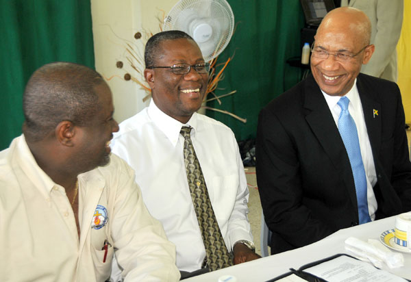 Governor-General, His Excellency the Most. Hon. Sir Patrick Allen (right), sharing pleasantries with outgoing President, Jamaica Council of Churches, Rev. Karl Johnson (left), and President, Moravian Church in Jamaica, Rev. Dr. Paul Gardner, at a meeting of denominational heads and leaders of the church, held at the Jamaica Theological Seminary, in Kingston, today (September 4).