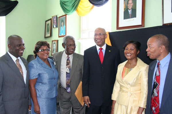 The Governor-General, His Excellency the most Honourable Sir Patrick Allen (third right) and Her Excellency Lady Allen (second right) pose for the cameras following a special sitting of the Trelawny Parish Council which the Governor General addressed. Mayor of Falmouth, Councillor Collin Gager (left), Member of Parliament for South Trelawny, Mrs. Marisa Dalrymple-Philibert (second left),Custos of Trelawny, the Hon Royland Barrett (third left) and Member of Parliament for North Trelawny Dr. Patrick Harris (right) joined him in the occasion.