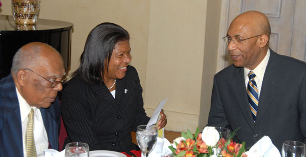 Governor-General, His Excellency the Most. Hon. Sir Patrick Allen (right), converses with former Governor-General, His Excellency the Most Hon. Sir Howard Cooke (left) and Chief Justice, Hon. Zaila McCalla, during the annual Custodes luncheon at King's House recently. The island's senior Custodes - the Rev. Canon the Hon. Weeville Gordon, OJ, Kingston; Hon. Roylan Barrett, CD, Trelawny; and Hon. Clarence Nelson, St. James, were honoured at the function.