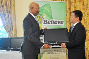 GG presents computers to IBI Villages and Back2Life