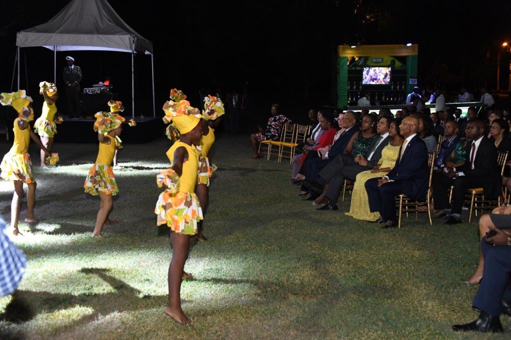 Guests at The Governor-General’s Independence Reception are treated to a dance performance from young Jamaicans.