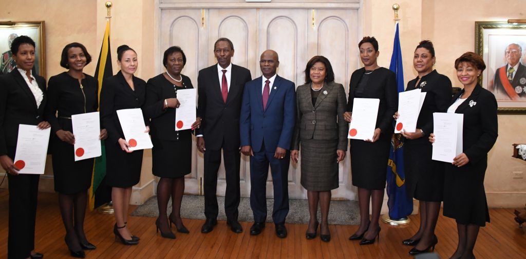 Custos Rotulorum for the parish of Kingston and Deputy Governor-General the Honourable Steadman Fuller (center) is joined by Hon. Mrs. Justice Zaila McCalla – Chief Justice (4th right), the Hon Mr. Justice Denis Morrison - President of the Court of Appeal (5th left) and the judges sworn in to serve in the Supreme Court and as Master-in Chamber, at King’s House this morning (January 5, 2018). The Judges from left are Her Honour Mrs. Sonya M. Wint Blair, Her Honour Mrs. Stephanie A. Jackson Haisley, Her Hon. Miss Carolyn N. Tie, Her Honour Miss Judith A. Pusey, Her Honour Mrs. Simone A.Y. Wolfe Reece, Her Honour Miss Anne-Marie A. Nembhard and Her Honour Mrs. Natalie T. Hart Hines.