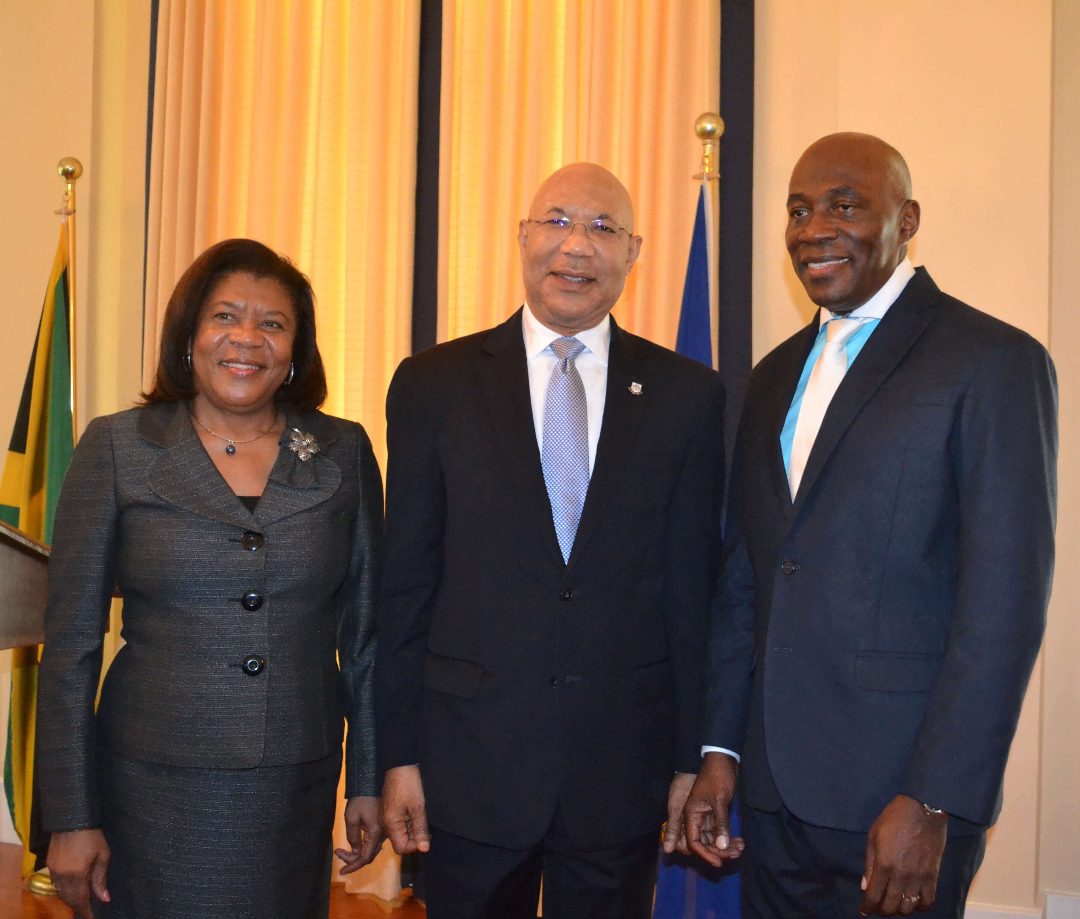 His Excellency The Governor-General (centre) shares lens with Her Honour Mrs. Justice Zaila McCalla (left), outgoing Chief Justice and the Honourable Mr. Justice Bryan Sykes (right) after his swearing-in ceremony to act as Chief Justice.